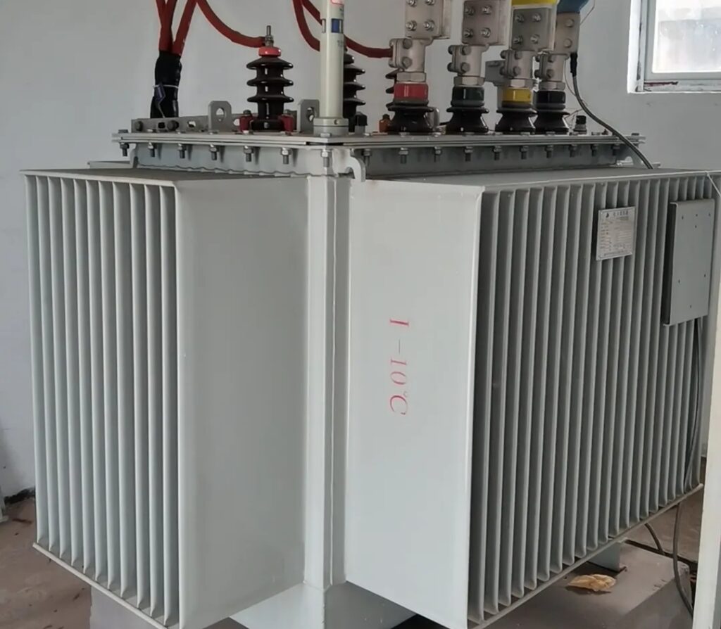 Technical nameplate of high-performance 1250 kVA S11-M oil-immersed power transformer, manufactured in January 2021, showing detailed electrical specifications for worldwide industrial export.