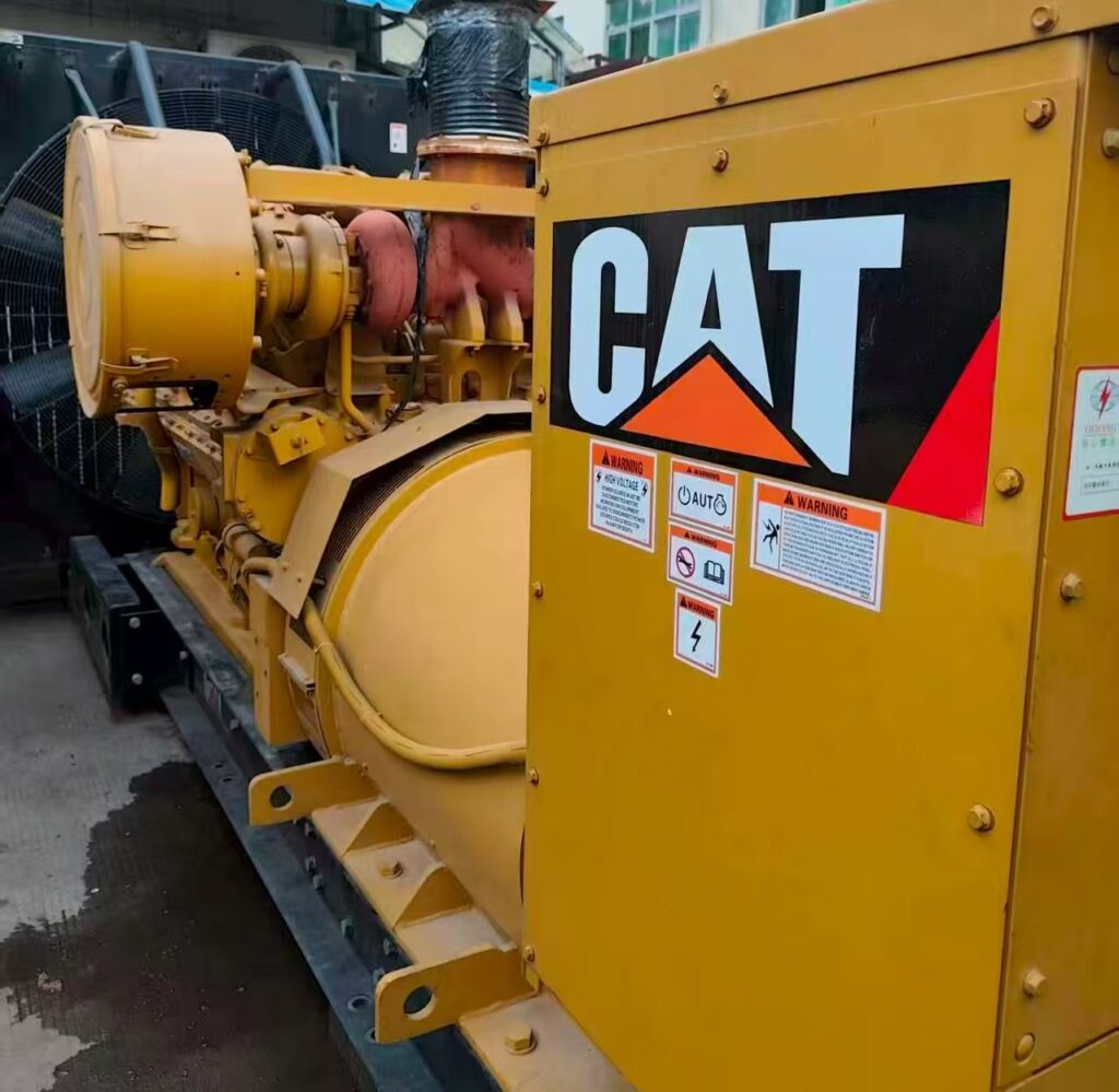 Refurbished Caterpillar 3512 industrial diesel generator set with CAT logo.