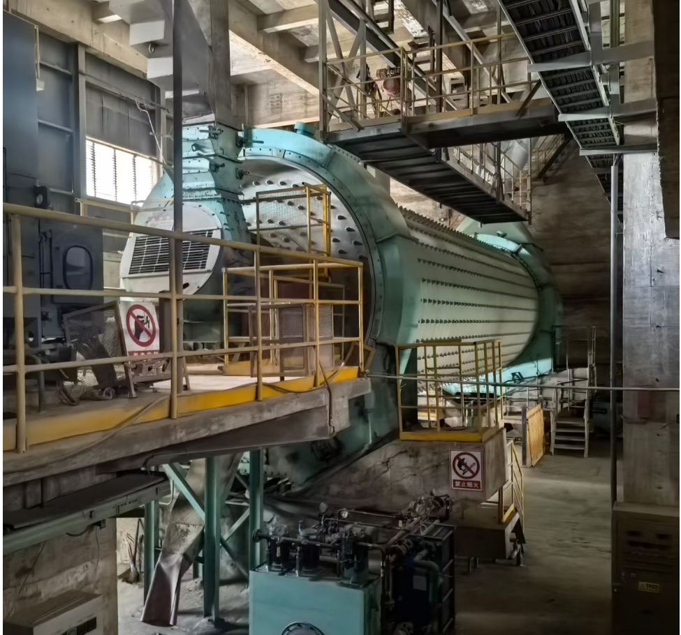 Full view of a refurbished CITIC Φ3.8 x 13m ball mill, essential cement production equipment for large-scale plants.